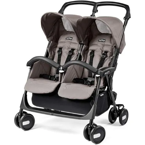 O Carrinho de Bebê Duplo Aria Shopper Twin, Mod Beige, da Peg Perego é ideal para pais que desejam praticidade e conforto para seus gêmeos ou filhos de idades próximas (entre 6 e 36 meses).